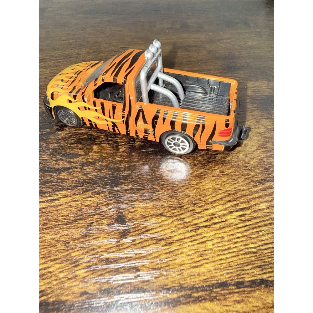 Maisto Ford F-150 SVT Lightning Tiger Stripe Pickup Truck‎ 1:24 Diecast Orange